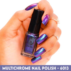 Bottle of color-shifting Purple Green Red Gold multichrome nail polish with high-gloss finish