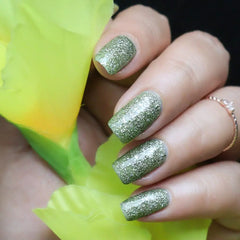 Algae Green crushed metallic foil nail polish with flat finish.