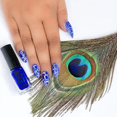 Blue and white nail polish with peacock feather