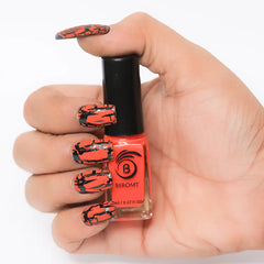 Orange and black crackle nail polish