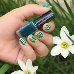 Ocean Blue crackle nail polish with white flowers